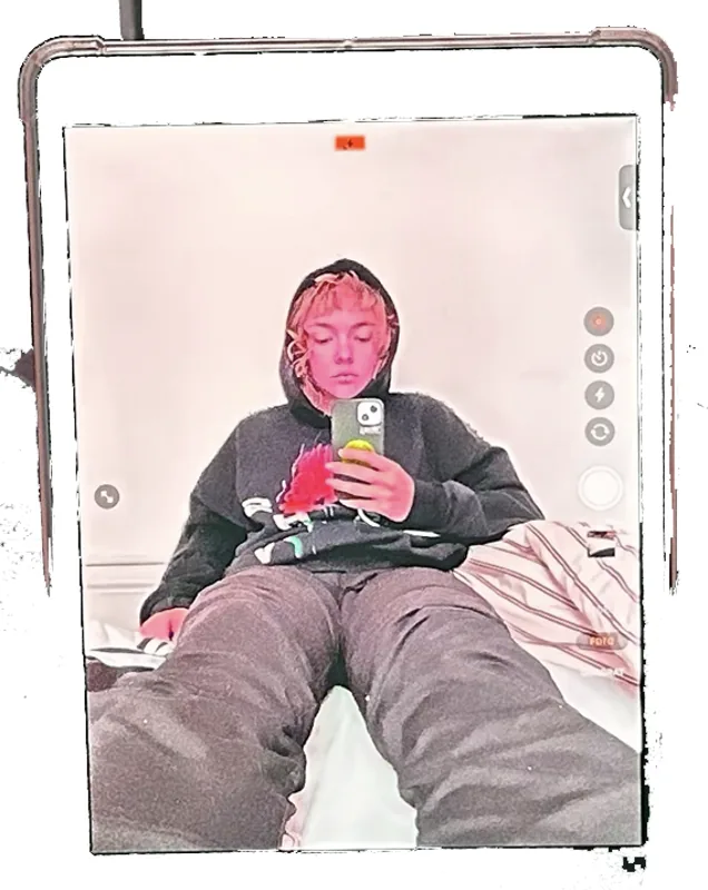 phia, mirror selfie in a hoodie, photographed on an iPad screen and cut out