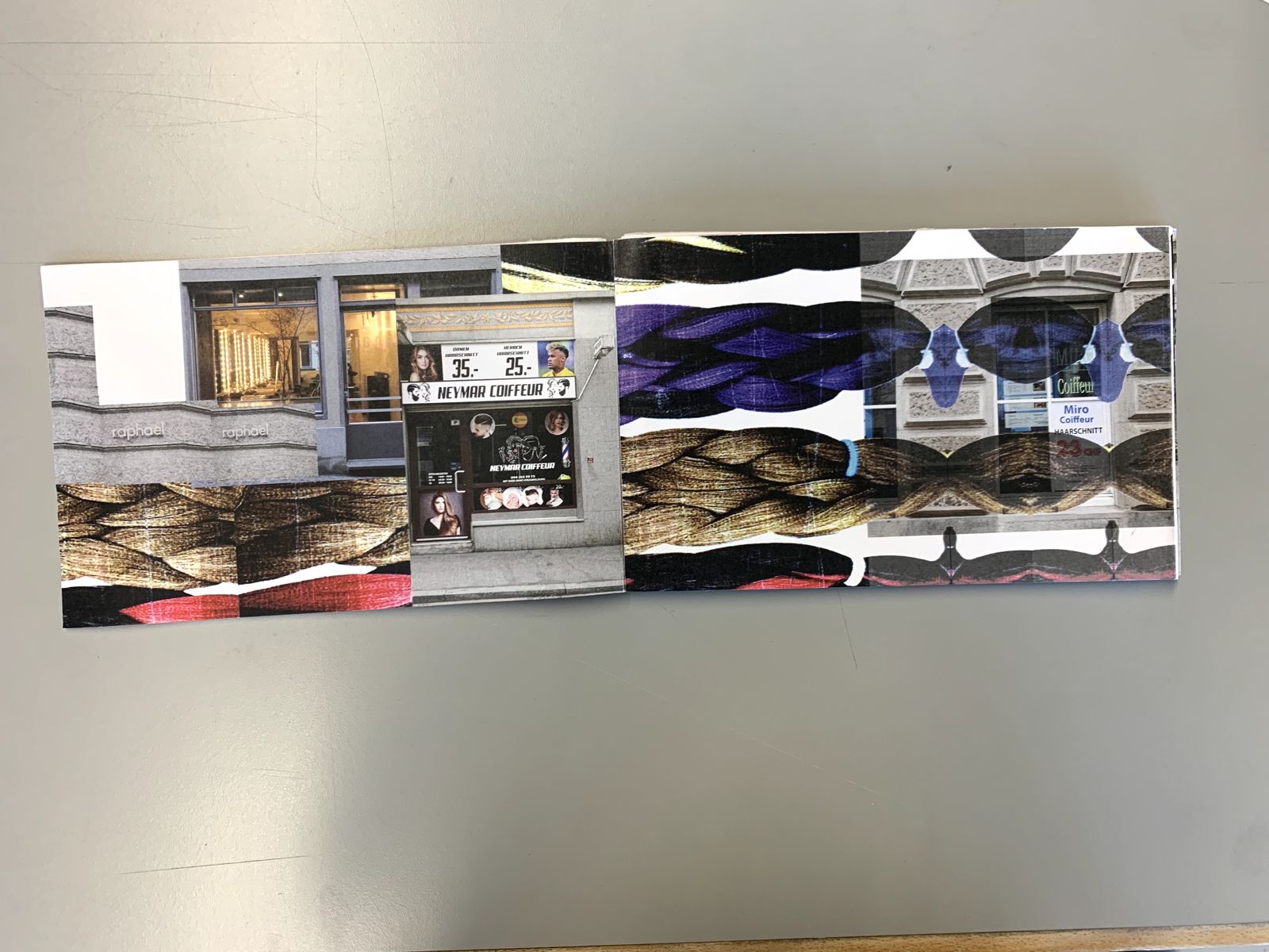 the printed leporello partly unfolded on a grey table