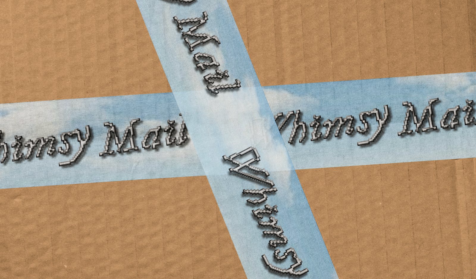 packing tape mockup: sky blue tape with the chrome logo, crossed over a cardboard box